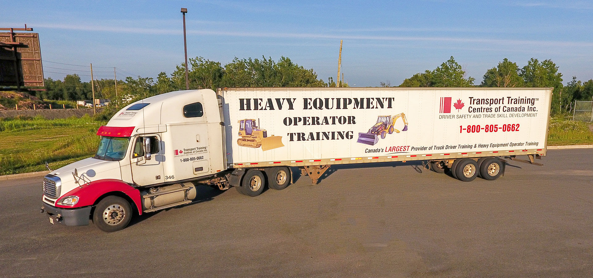 Photo of a truck with the TTCC logo on the side and the words Heavy Equipment Operator Training in Saint John, NB