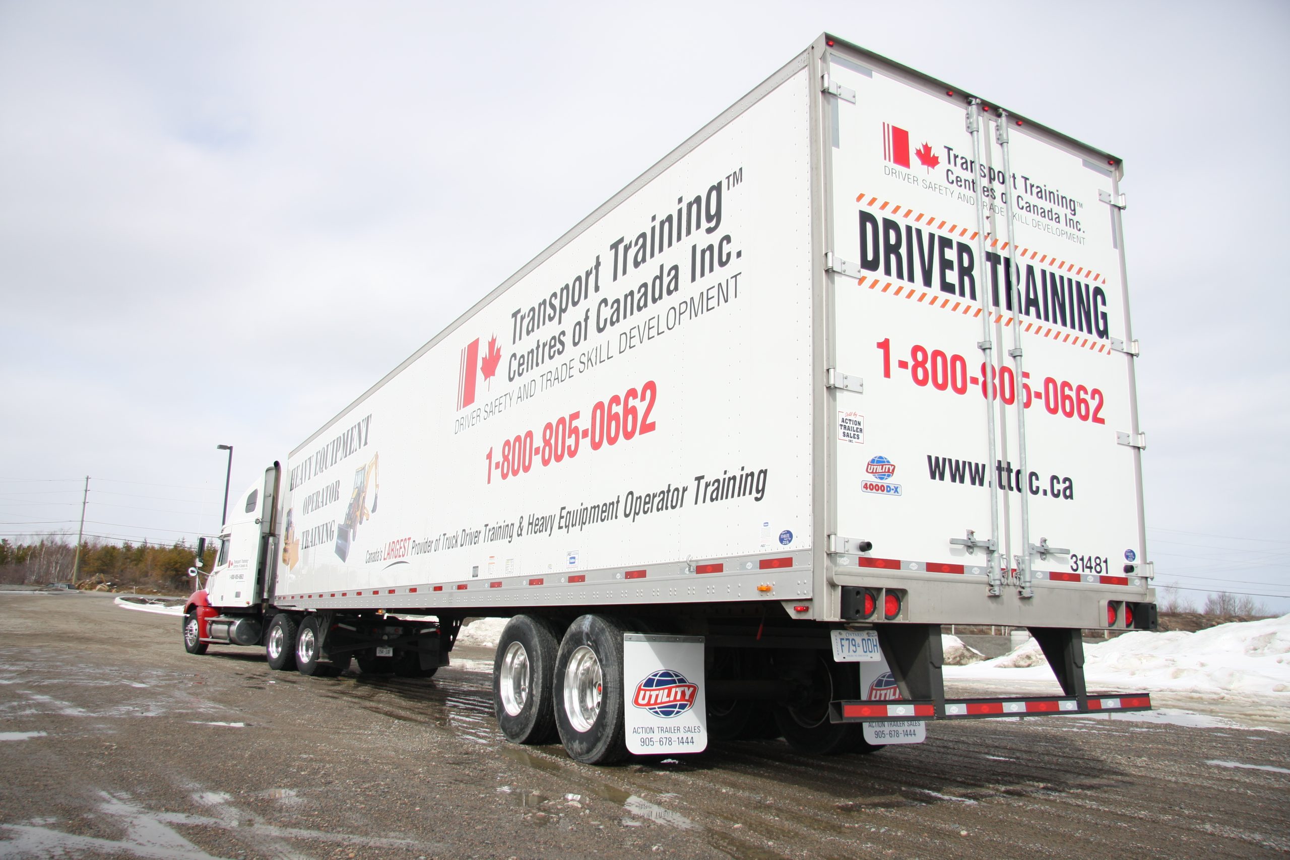 Photo of a truck with TTCC logo on the side and Driver Training on the back.
